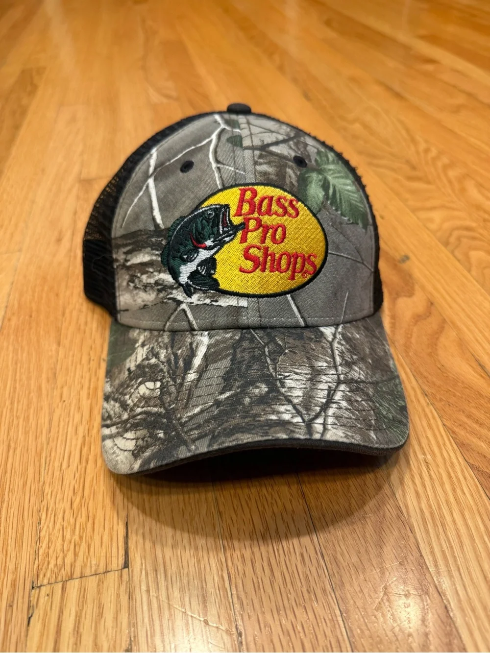 Bass Camo Trucker Hat with Yellow Logo